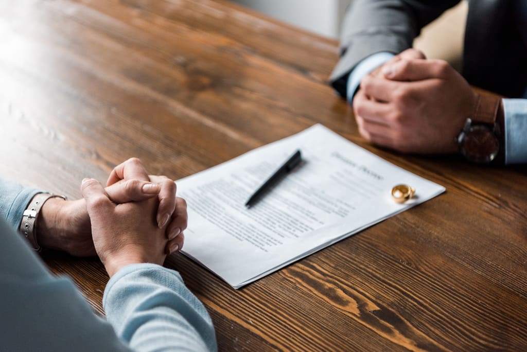 Lawyer Discussing With His Client